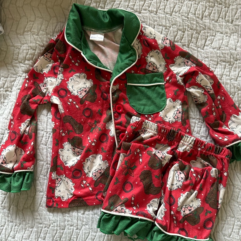 Cowboy Santa pajamas. Size L 4t